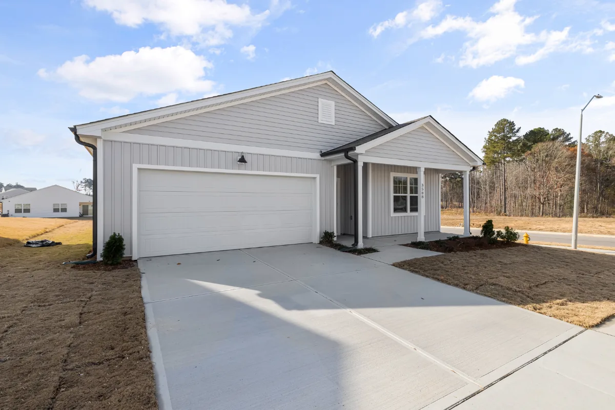 Newly finished concrete driveway at a new construction home in Western NC - The Asheville Concrete Company